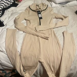 3- bodysuits
1-beige long sleeve NWT
1-grey long sleeve NWT
1-beige straps
